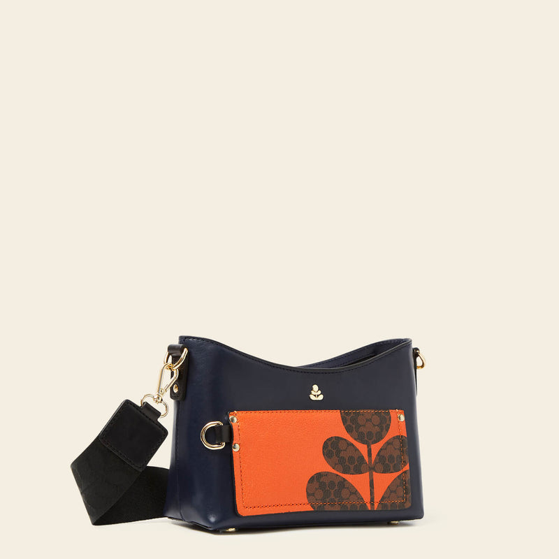 Carrymin Crossbody in Navy Puzzle Flower pattern by Orla Kiely