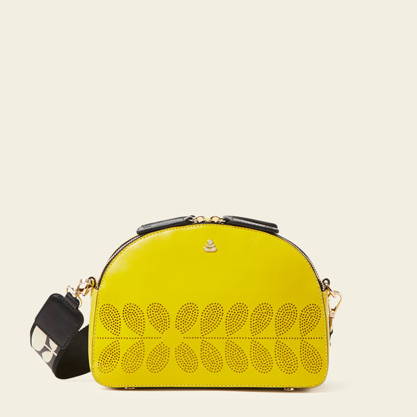 Luna Crossbody Bag in Daffodil Punched Flower by Orla Kiely