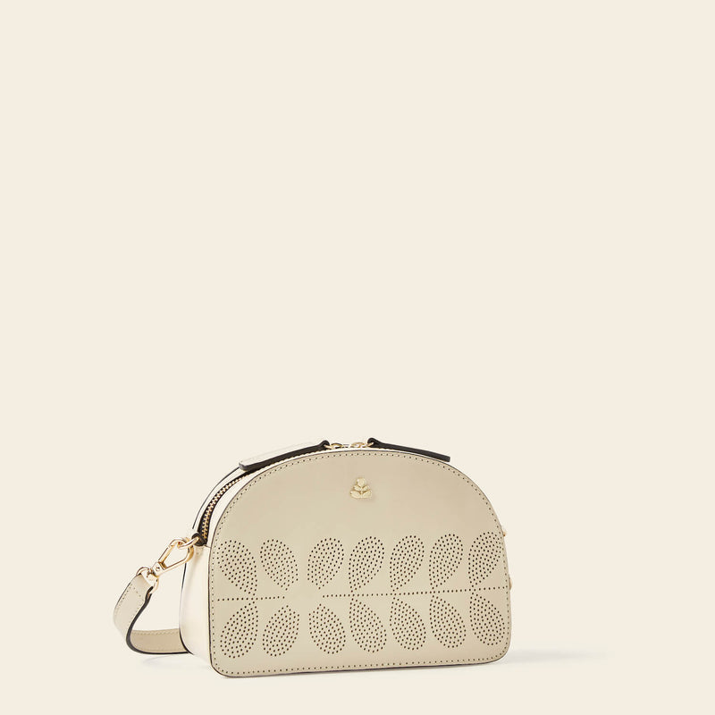 Babaluna Crossbody Bag in Cream Punched Flower pattern by Orla Kiely