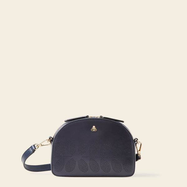 Babaluna Crossbody Bag in Navy Punched Flower pattern by Orla Kiely